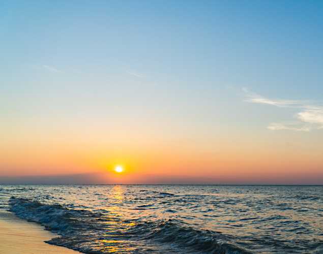 sunrise over a beach