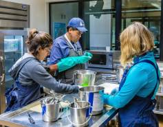volunteers prepare patient meals in the Fish Kitchen